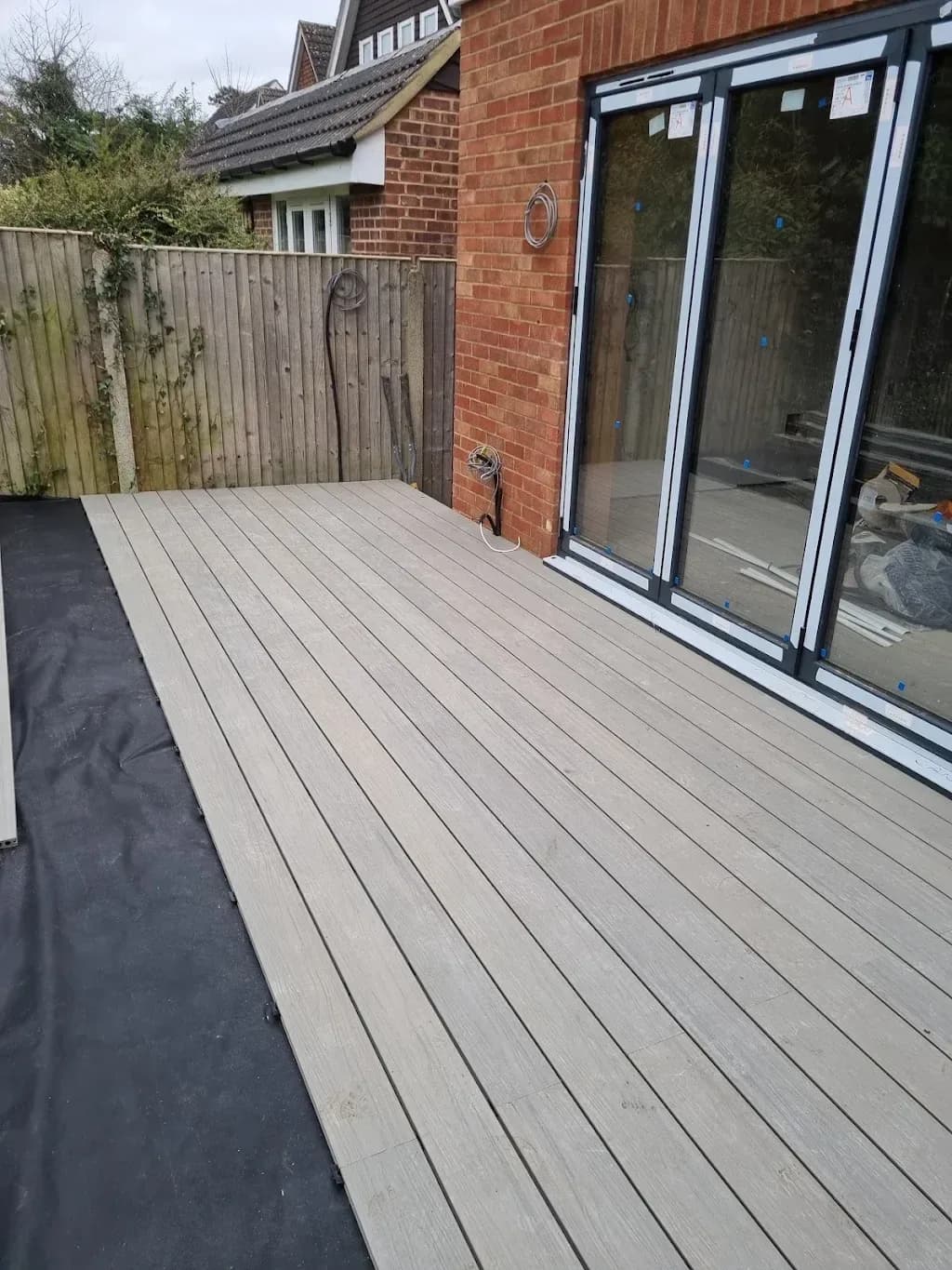 Composite decking laid outside bi-fold doors