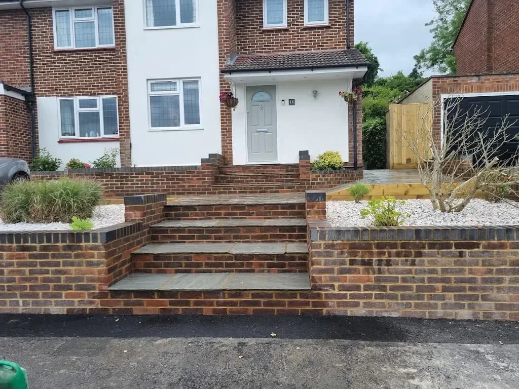 Brick retaining walls and front entrance steps